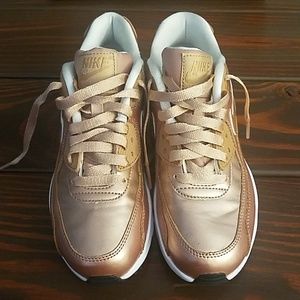 Rose gold Nike Air Max sneakers